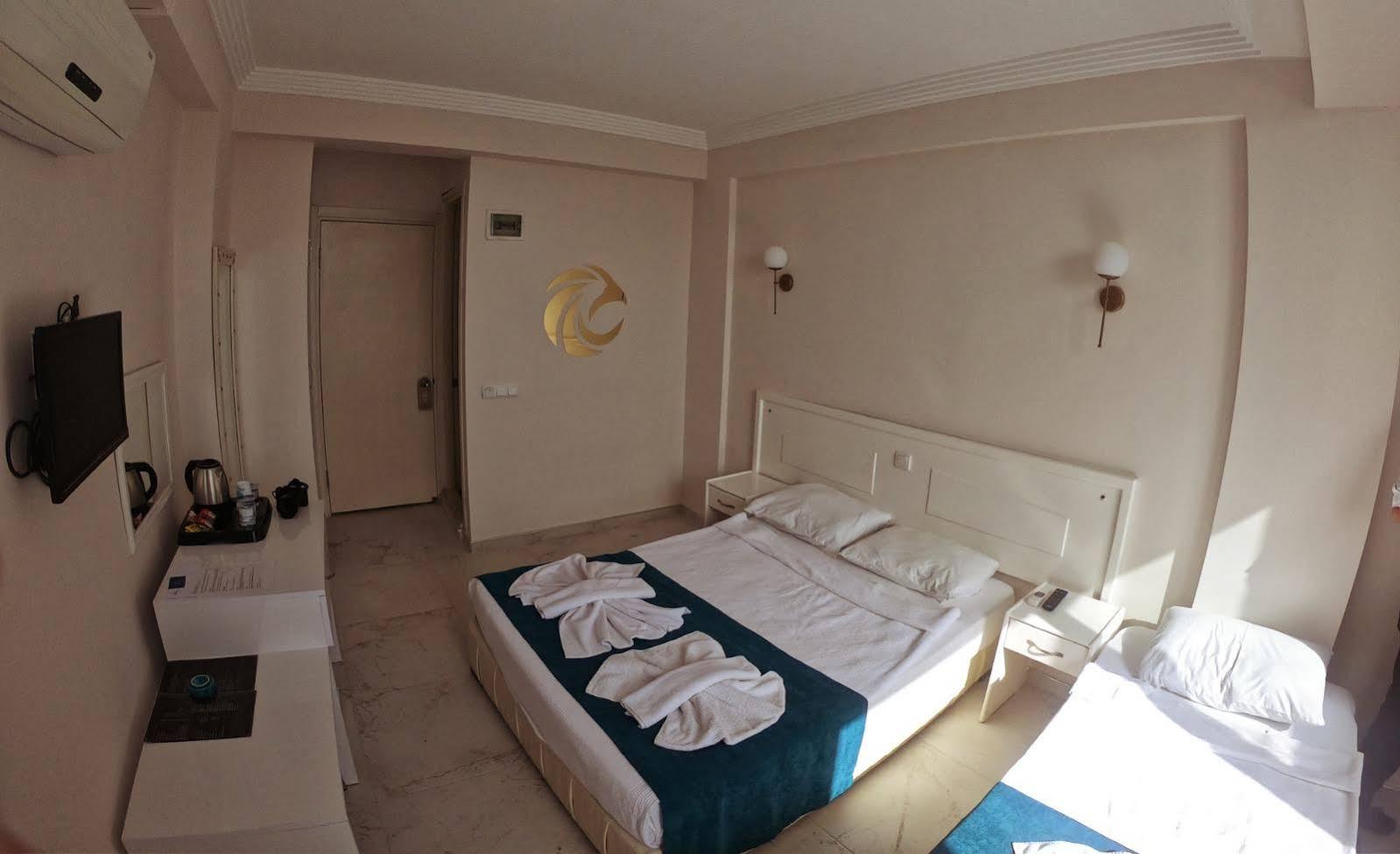 Aquila Beach Hotel Fethiye Bagian luar foto