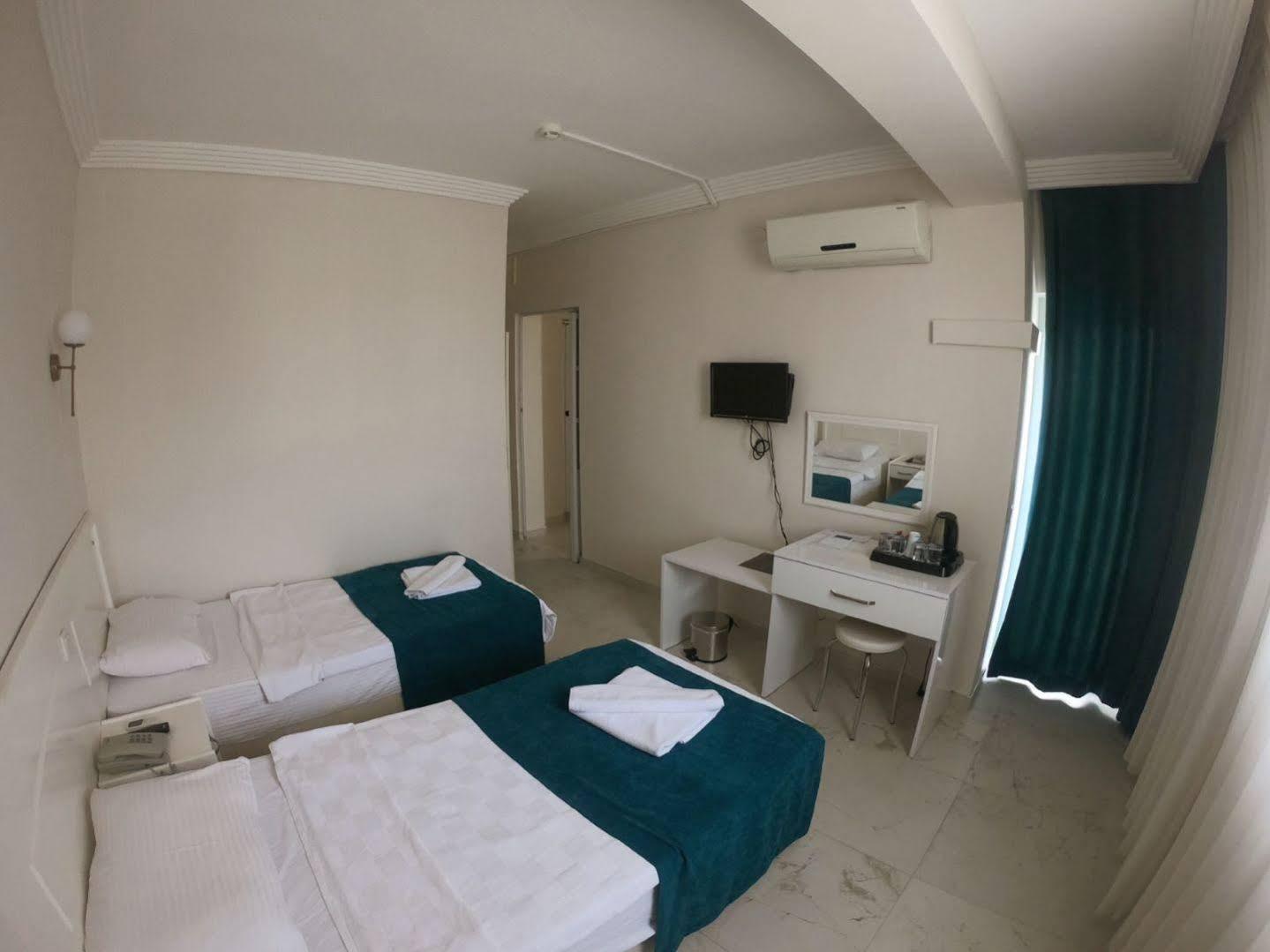 Aquila Beach Hotel Fethiye Bagian luar foto