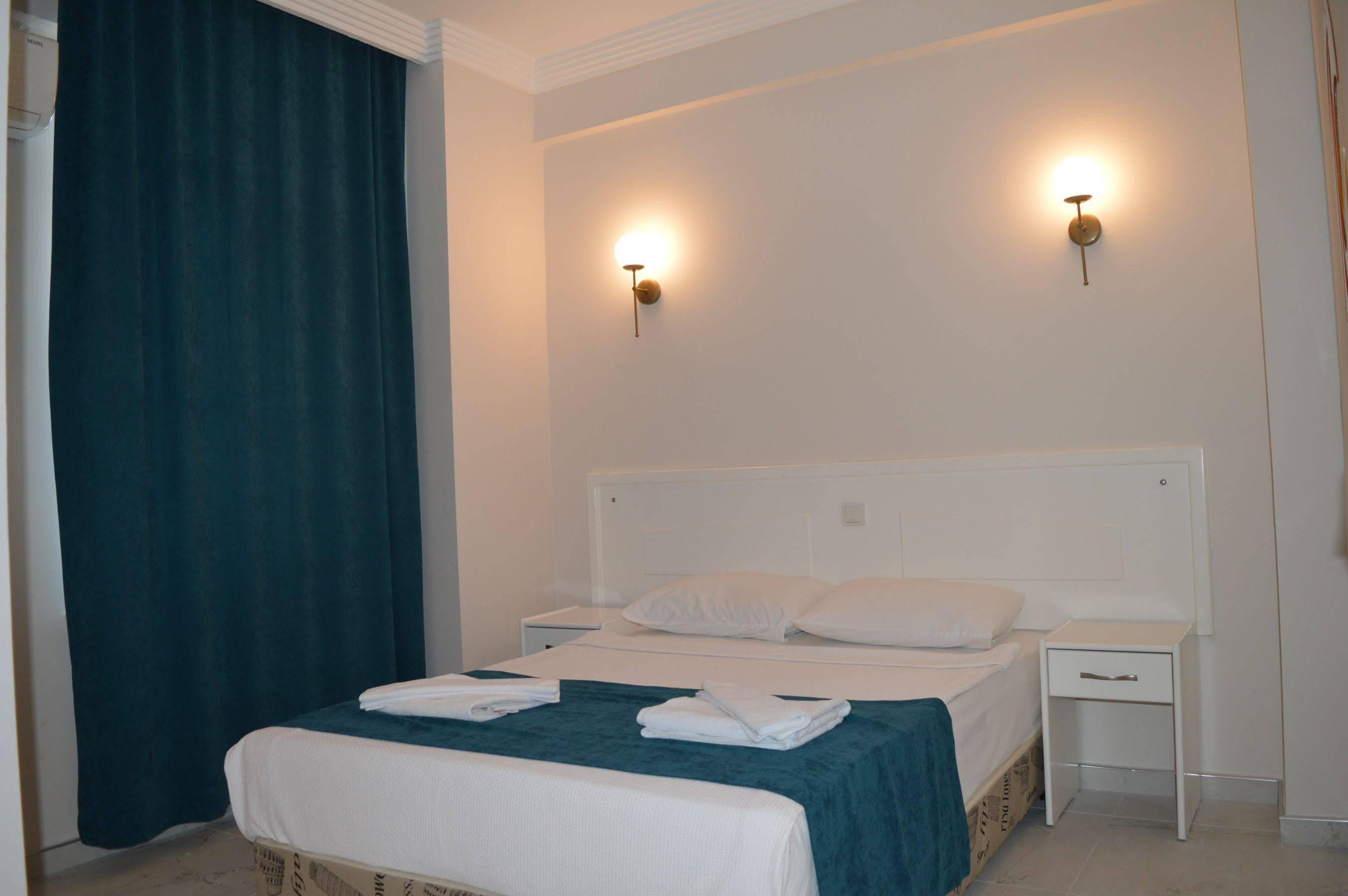 Aquila Beach Hotel Fethiye Bagian luar foto